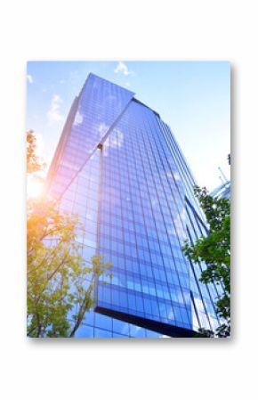 Sustainable glass office building with trees for reducing carbon dioxide. Eco-friendly building in modern city. Office with green environment. Corporate building reduce CO2.