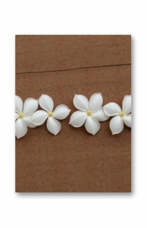 Cluster of Jasmine Flowers on a Wooden Surface