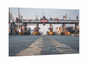 The border checkpoint stands prominently as vehicles approach the entrance, highlighting the busy atmosphere filled with anticipation. This border checkpoint is crucial for travele