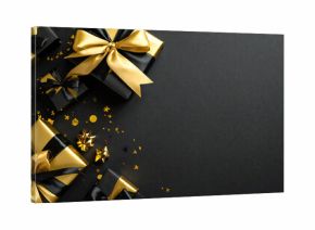 黒背景。金と黒のプレゼント。紙吹雪。ブラックフライデーのイメージ。Black background. Gold and black gifts. Confetti. Black Friday image.
