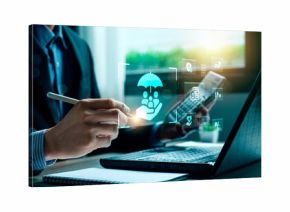 Business professional reviewing digital insurance solutions with holographic protection icons, symbolizing family security, financial safety, modern insurance planning, innovative InsurTech services