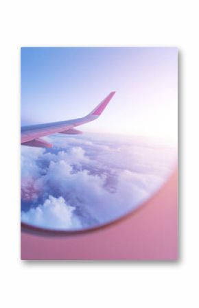 View from the cockpit of the plane to the beautiful clouds during sunset