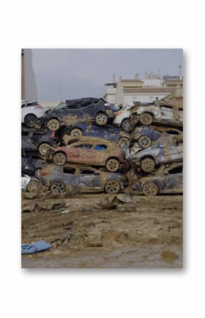 Crowd of cars destroyed by floods in Alfafar, Valencia, Spain. natural disaster.November 2024