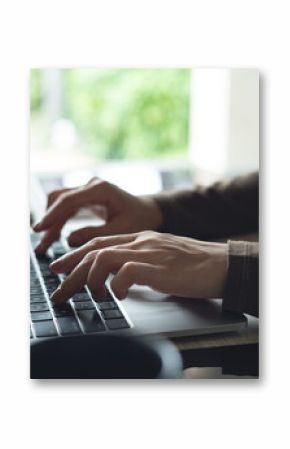 Business woman in casual dress working on laptop computer at home office. Close up, woman online working, surfing the internet, typing on laptop on office table, remote work, side view
