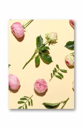 Beautiful pink roses and leaves on yellow background