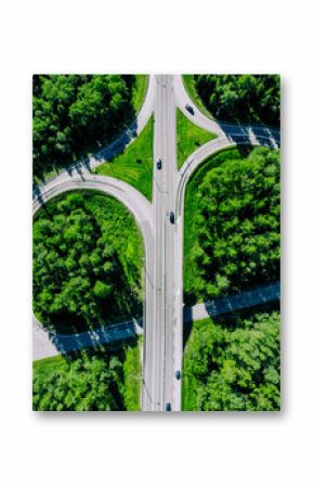 Aerial top down view of highway road junction with cars in Finland on a sunny summer day