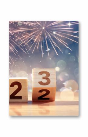 2023 New Year Celebration - Wooden Number Blocks And Fireworks At Blue Eve Night With Abstract Defocused Lights