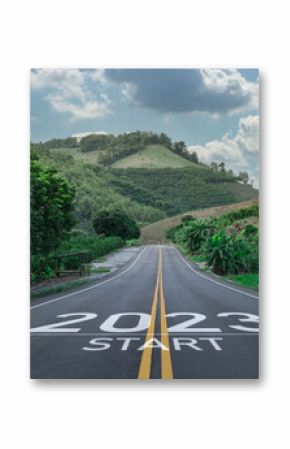 Happy new year 2023,2023 symbolizes the start of the new year. The letter start new year 2023 on the road in the nature route roadway have tree environment ecology or greenery wallpaper concept.