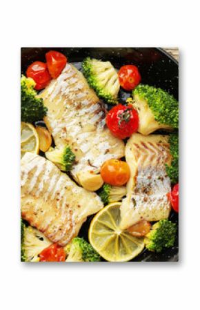 Tasty cod cooked with vegetables in frying pan on wooden table, top view