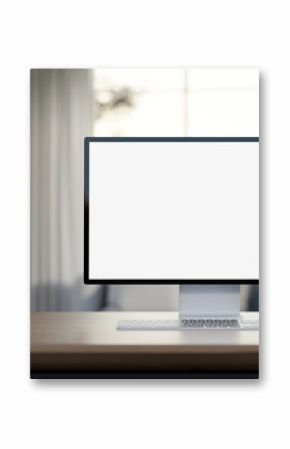 A white-screen computer mockup on a wooden desk in a contemporary living room.