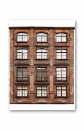 Old brick wall showing multiple windows on building facade, architectural detail background