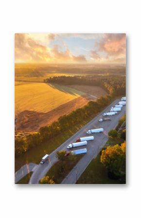 Rest area for semi trucks near busy interstate freeway. Truck stop place during hauling cargo