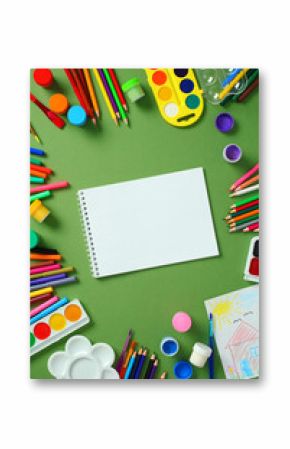 Sketchbook mockup: blank notebook page surrounded by paints and pencils on a green background