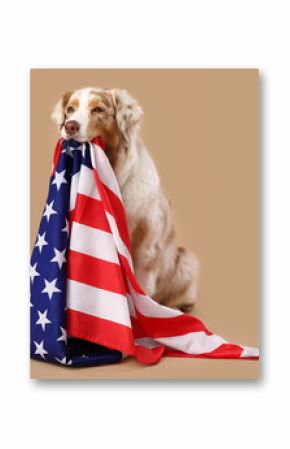 Cute dog with USA flag on beige background. Independence Day celebration