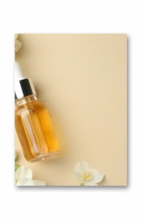 Essential oil and beautiful jasmine flowers on beige background, flat lay. Space for text