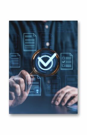 Businessman analyzing digital documents with magnifier and checkmark symbol.