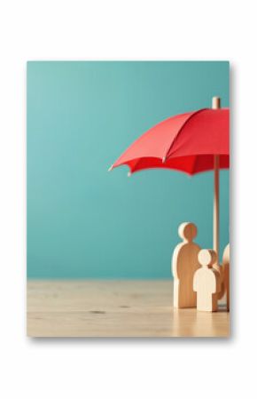 Wooden family figures under red umbrella representing health insurance, safety, family protection, healthcare concept. Symbol of protection security, care, life insurance, money investment, health