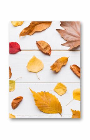 Autumn composition. Pattern made of dried leaves and other design accessories on table. Flat lay, top view
