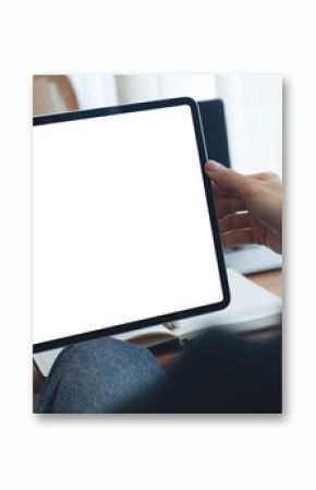 Mockup image of woman using digital tablet with blank white screen during working with laptop computer at coffee shop, close up. Mockup tablet for online marketing or web template