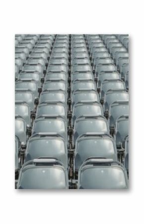 Rows of vacant metallic seats arranged for a corporate gathering or show, festival backdrop, design, commerce, workplace, illumination, sunlight, pale, athletics, stripe, group