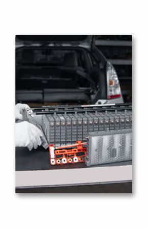 Serviceman repairs electric battery pack of hybrid car
