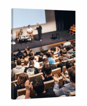 Interview and round table discussion at business convention and presentation. Audience at the conference hall. Business and entrepreneurship symposium.