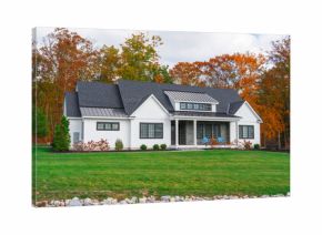 residential luxury house with colorful autumn trees