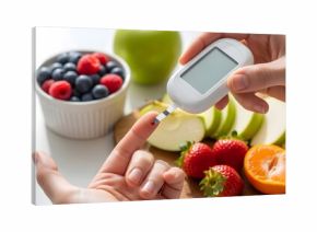 Healthy lifestyle and diabetes management concept with fresh fruits and glucometer for healthy eating and blood sugar monitoring