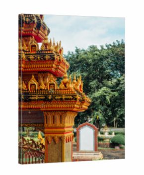 Ornate golden gate detail at Wat Chalong temple, Phuket