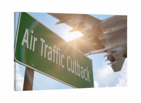 Air Traffic Cutback Green Road Sign with Airplane Above.