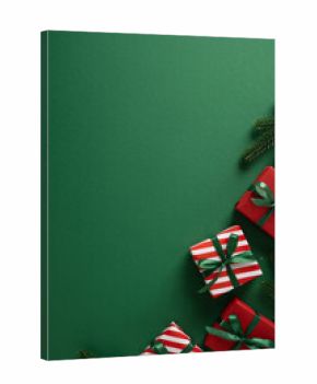 Vibrant vertical holiday scene featuring red and white striped gift boxes tied with green ribbons on a deep green backdrop
