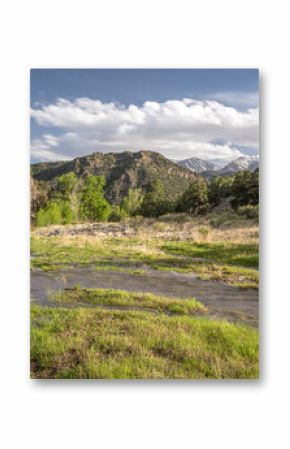 Colorado landscape with a creek and mountains