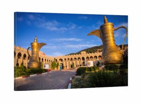 huge jars decorate the courtyard, Morocco