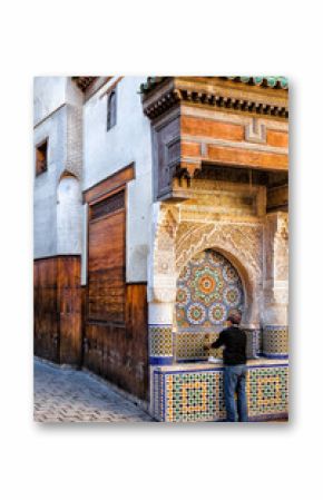 Water fountain in the old town medina of Fez, Morocco.