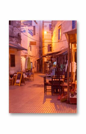 Old shopping street in Medina at  the evening.  Essaouira, Morocco
