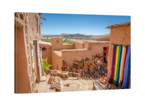 Narrow streets of Kasbah Ait Ben Haddou with traditional moroccan souvenirs, Morocco