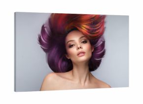 Beautiful woman with multi-colored hair and creative make up and hairstyle. Beauty face.