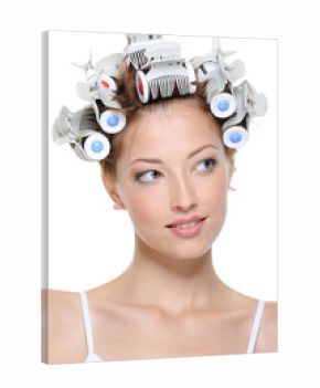 young smiling female with curlers