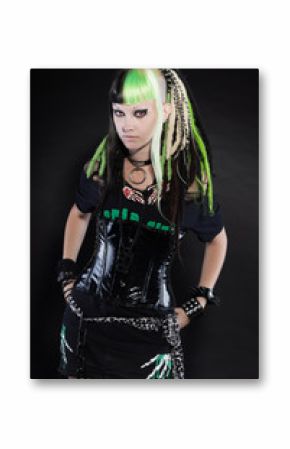 Cyber punk girl with green blond hair and red eyes against black