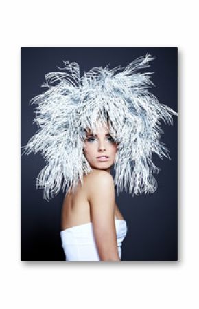 Young woman in creative image with silver artistic make-up.