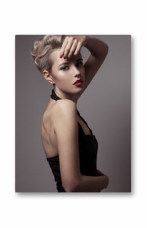 Beautiful Blonde Woman. Retro Fashion Image.