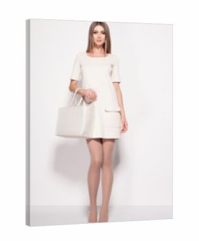 beautiful woman with long sexy legs dressed elegant posing