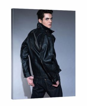 Retro rock and roll 50s fashion man with dark grease hair. Weari