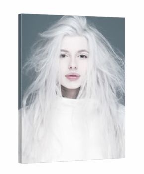 Blonde fashion woman sexy natural lips posed on blue background