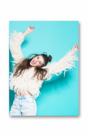 portrait of cheerful fashion hipster girl going crazy making