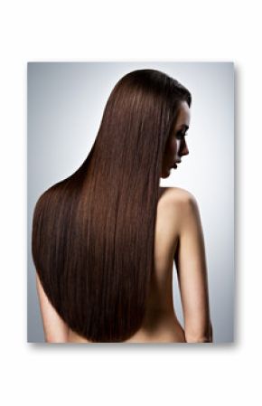 Portrait of beautiful woman with long straight brown hair