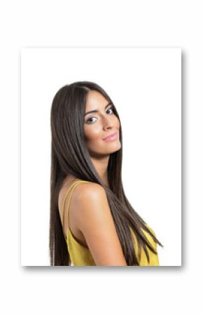 Beautiful young woman with long straight healthy hair turning head to camera
