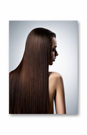 Portrait of beautiful woman with long straight brown hair