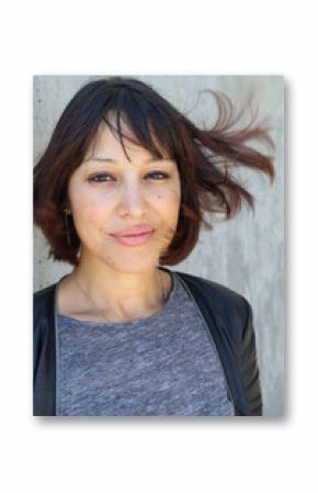 Portrait of female face with creative hairstyle. Brunette young woman face closeup. Hipster girl with fringe hairstyle. 
