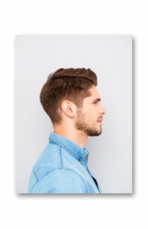 Side view portrait of handsome man in blue shirt